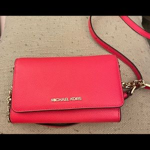 Authentic Michael Kors cell phone crossbody wallet.